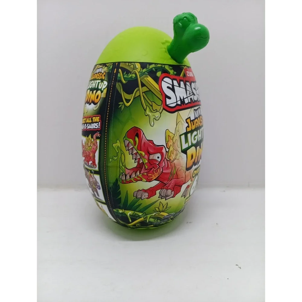 Zuru Smashers Mini Jurassic Light Up Dino Green Bone 6 Surprises Slime Egg ~NWT